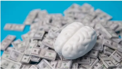 Brain scan illustration with money symbols representing financial hardship